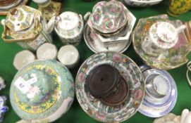 A collection of Oriental porcelain to include ginger jar and cover, teapot and matching beakers, two