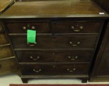 A mahogany chest of two short and three long drawers on bracket feet