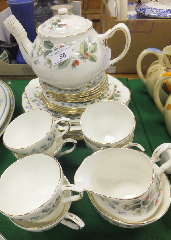 A Duchess "Strawberry Fields" pattern tea set comprising teapot, jug, bowl, cups and saucers, side