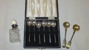 A cased set of six mid 20th century silver coffee spoons (Sheffield 1956), two plated mustard