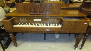 A John Broadwood & Sons mahogany square piano of typical outline, the hinged top revealing a