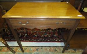 A 19th Century mahogany hall table, the rectangular moulded edge top over a frieze drawer on