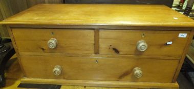 A pine chest of two short over one long drawer   CONDITION REPORTS  Height approx 42cm.  General