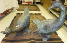 A pair of Chinese bronze verdigris models of geese