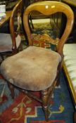 A set of four Victorian chairs with velvet padded seats on turned and splayed legs to front