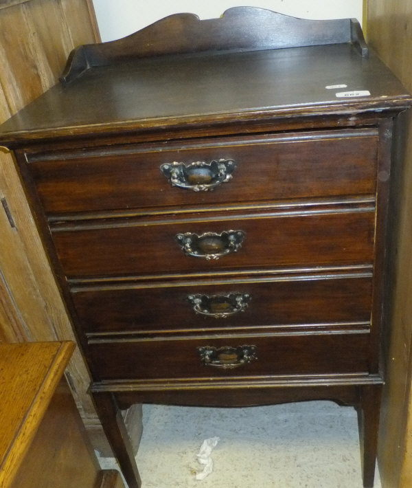 An Edwardian mahogany music cabinet on square tapering legs