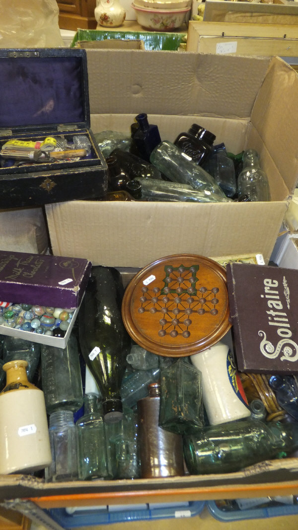 A box of assorted Victorian and later glass and stoneware bottles, together with a box of assorted