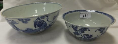A 19th Century Chinese blue and white bowl with slightly flared rim, raised on circular foot, the