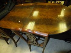 A D-end reproduction Regency style extending dining table on twin pedestal base to claw feet,