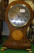 A circa 1900 mahogany and inlaid balloon clock, the movement stamped "DC Co."   CONDITION REPORTS