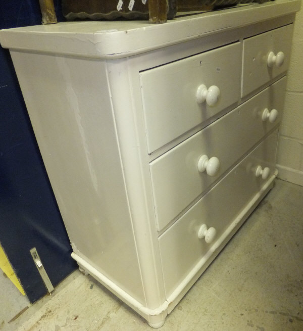 A Victorian white painted chest of two short over two long drawers