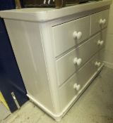 A Victorian white painted chest of two short over two long drawers