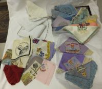 A collection of vintage handkerchiefs to include embroidered examples, military subjects, Royal