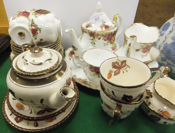 A collection of Royal Albert "Old Country Roses" pattern tea wares, to include teapot, cups, and