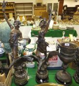 A pair of late 19th century French spelter figures "Le Jour" and "Le Nuit", each on an ebonised