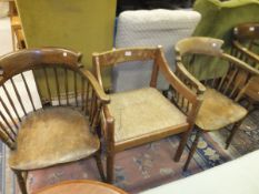 A pair of circa 1900 beech framed stick back tub chairs and a Magistretti Modello 115 rush seated