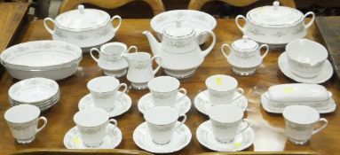 A collection of Noritake "Melissa" pattern dinner and tea wares to include two lidded tureens, salad