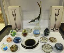 A pair of Dartington candlesticks, a selection of paperweights to include examples by Hadleigh, a