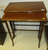 An early 20th Century mahogany and satinwood banded chest of two occasional tables, the