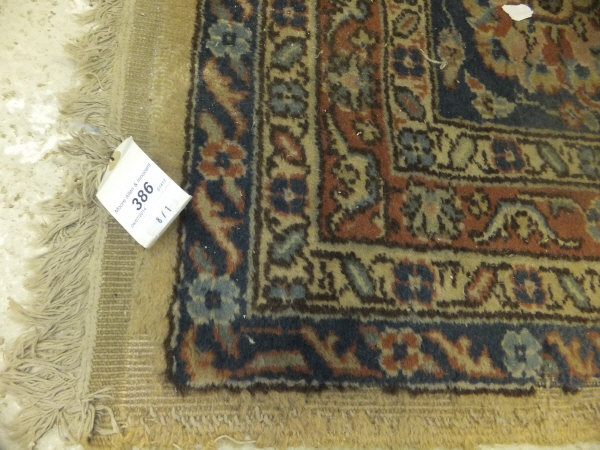A Persian carpet, 397 x 570 cm   CONDITION REPORTS  Very dirt and worn.  Faded.  A lot of threadbare