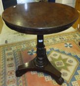 A 19th Century circular occasional table on acanthus carved baluster support to tripod base