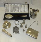 An early 20th century silver capstan ink well, silver evening purse, white metal purse, Indian white