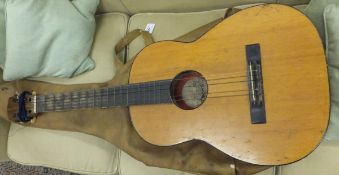 A nylon stringed classical guitar with label to interior "TATRA Classic", in case