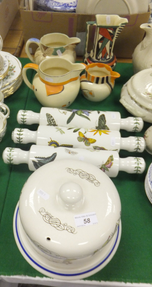 A collection of four Myott Son & Co. jugs, three Portmeirion "Royal Botanic Garden" pattern