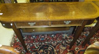 A walnut D end hall table with two short drawers to the frieze and square tapering legs