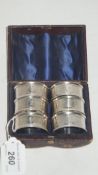 A cased set of six silver and engraved napkin rings numbered 1 to 6   CONDITION REPORTS  Case