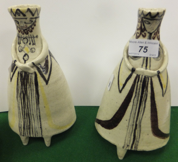 A pair of studio pottery vases of stylised form modelled as a king and a queen   CONDITION