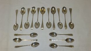 A set of eleven Victorian silver teaspoons with bright cut decoration and cross motif to handles,