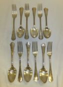A set of six continental plate table forks and spoons, bearing French marks and stamped "A.R."