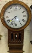 A 19th Century American drop dial wall clock, with enamelled dial, in a parquetry inlaid walnut