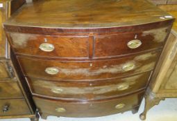 A Victorian mahogany bow fronted chest of two short and three long drawers
