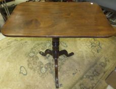 A 19th Century rectangular tilt top occasional table on turned pedestal to tripod base