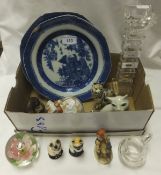 A box containing a small collection of decorative china and glassware to include a Goebel Hummel