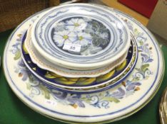 A collection of seven Continental pottery plates and chargers