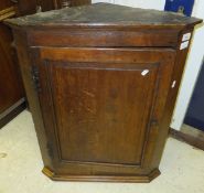 A 19th Century oak hanging corner cupboard   CONDITION REPORTS  Wear and scuffs, various splits,
