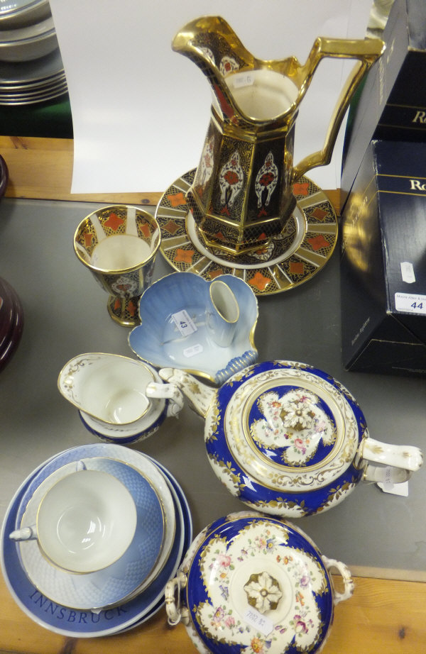 A collection of Bing and Grondahl blue and white and gilt decorated china wares with seagull design,