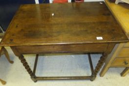 A 19th Century oak side table on bobbin turned supports united by stretchers