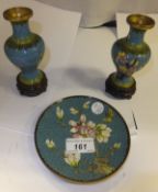 A pair of circa 1900 Chinese cloisonné vases of baluster form with coloured flowers on a blue ground