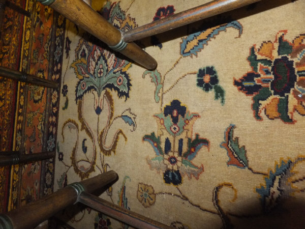 A Tabriz carpet, the central cream field with stylised floral decoration in blue, red, green and - Image 5 of 7