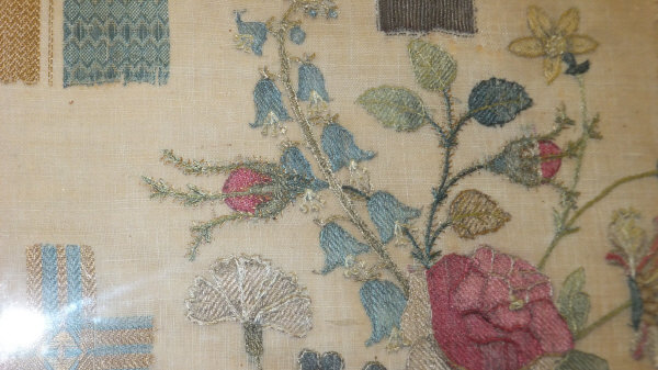 An early 19th century needlework sampler demonstrating embroidery designs and depicting floral spray - Image 10 of 15