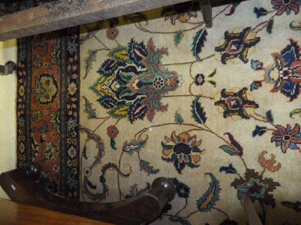 A Tabriz carpet, the central cream field with stylised floral decoration in blue, red, green and - Image 4 of 7