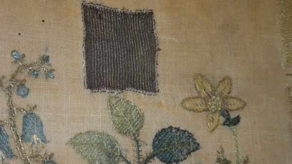 An early 19th century needlework sampler demonstrating embroidery designs and depicting floral spray - Image 14 of 15
