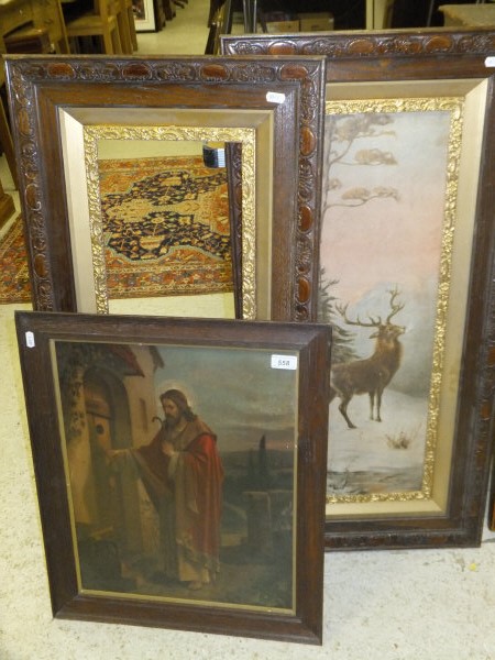 Study of a stag in decorative oak frame, another matching oak frame and a print of Jesus