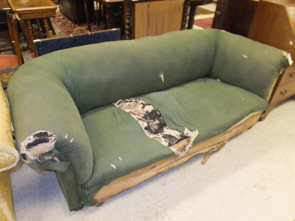 A Victorian upholstered scroll Chesterfield sofa