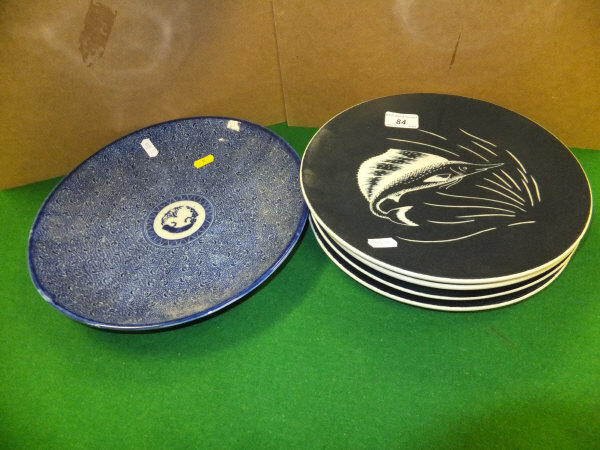 A set of four South African Drostdy ware pottery plates decorated with fish and inscribed verso "