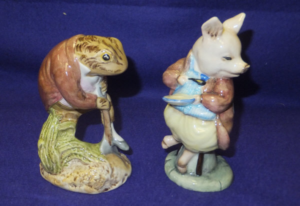Two Royal Albert Beatrix Potter figures comprising "Pigling eats his porridge" and "Mr. Jeremy